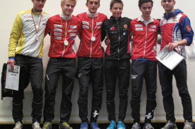 Erik Döhler als 4. im Sprint inmitten der Geehrten auf dem Podium